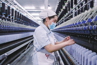 加強人才體系建設(shè) 推進(jìn)紡織行業(yè)智能制造——訪全國人大代表范冬云