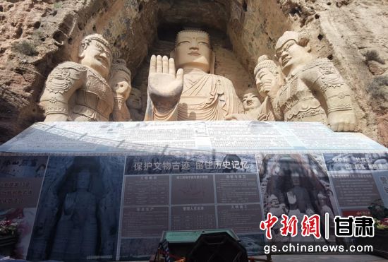 時下，中國“石窟鼻祖”天梯山石窟第13窟大佛足部與局部危巖體搶救性保護項目正在施工。圖為施工現(xiàn)場。陳曉斌 攝