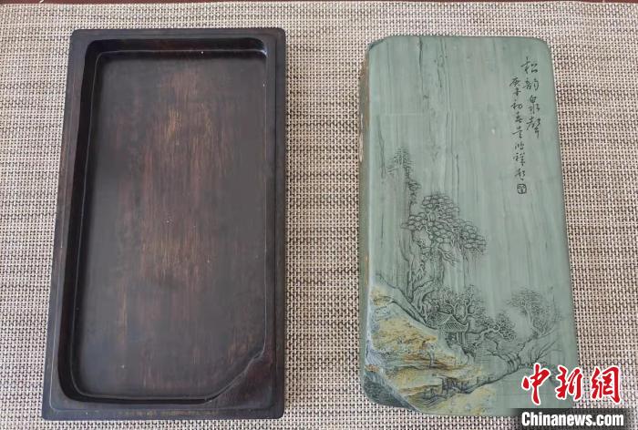圖為盧保勝為提升洮硯文化內(nèi)涵，制作“一硯一銘、一盒一拓”成品展示?！堟?攝